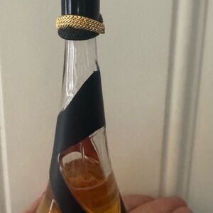 Elegant Black and Gold Bottle Rihanna Reb’l Fleur